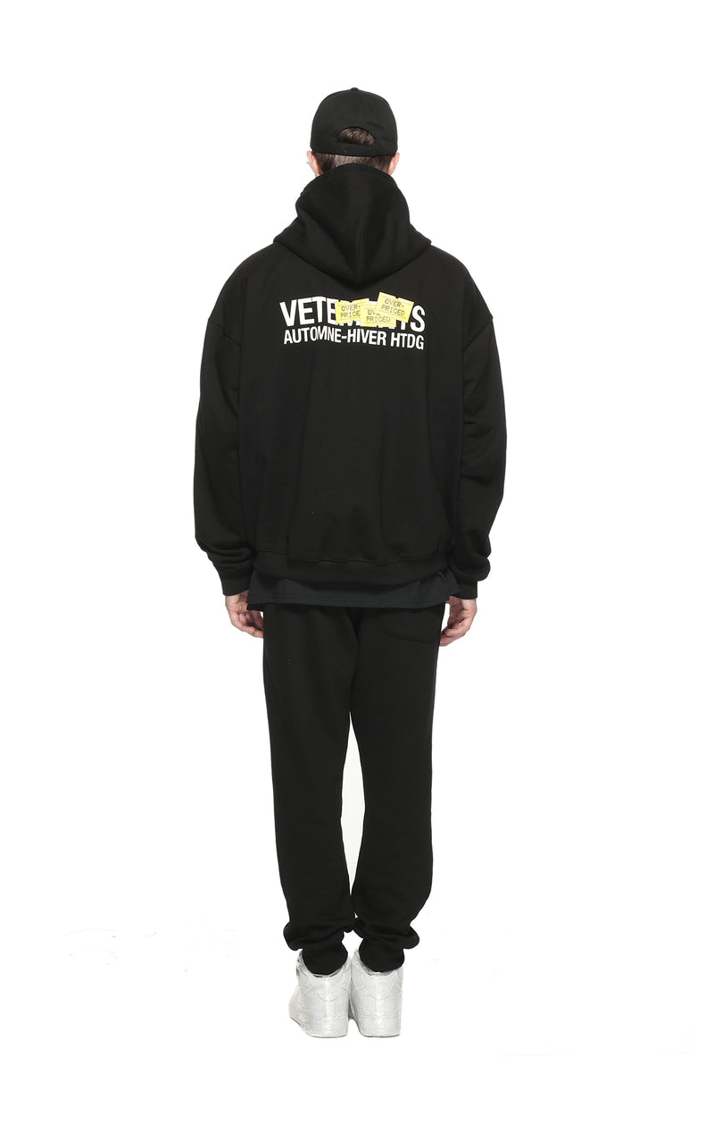 “VETE OVERPRICED, AUTOMNEHIVER HTDG” Zip-Up Hoodie